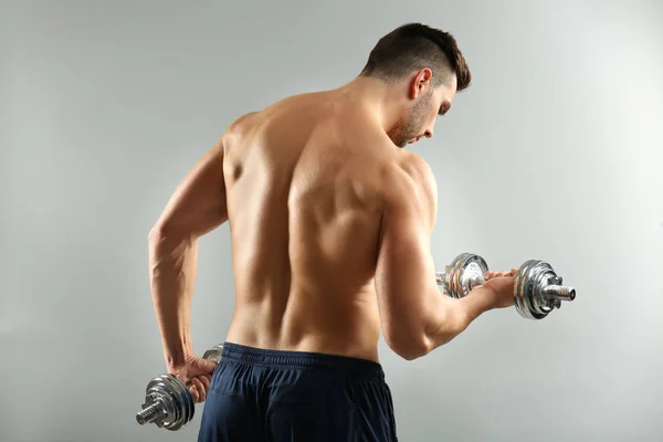 Sporty man doing exercises — Stock Photo, Image