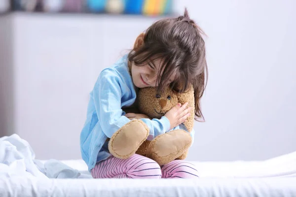 Funny little girl with toy — Stock Photo, Image