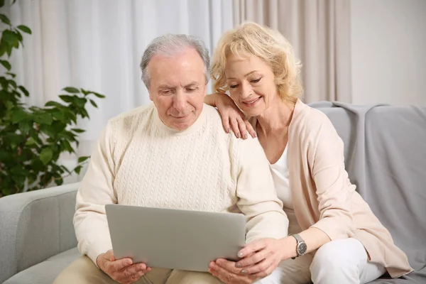 Senior couple making video call