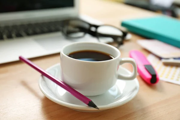 Cup of coffee on table — Stock Photo, Image