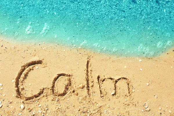Word sakin plaj kum üzerinde — Stok fotoğraf
