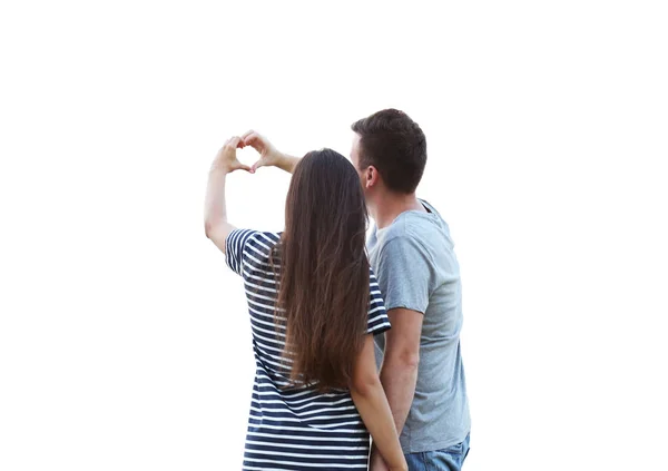 年轻夫妇手牵着手在心的形状 — 图库照片