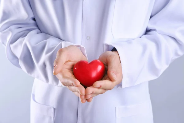 Phands holding red heart — Stock Photo, Image