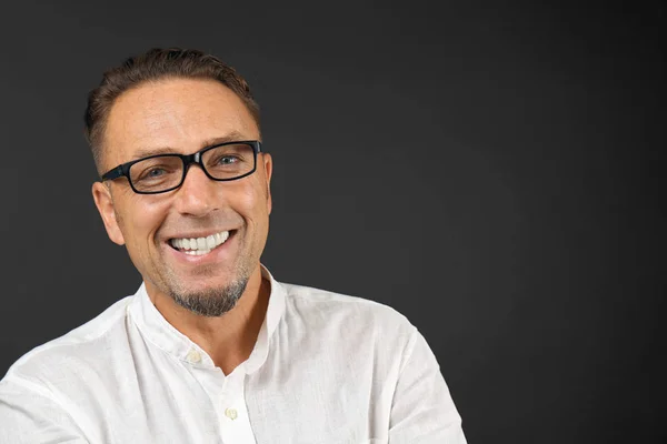 Handsome man on black background — Stock Photo, Image