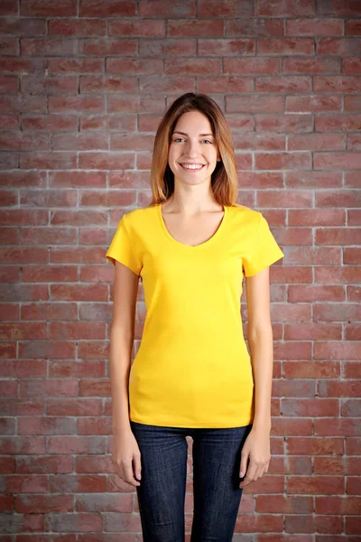 Young woman in blank t-shirt — Stock Photo, Image