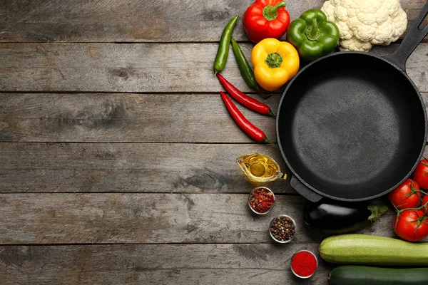 Iron frying pan with products — Stock Photo, Image