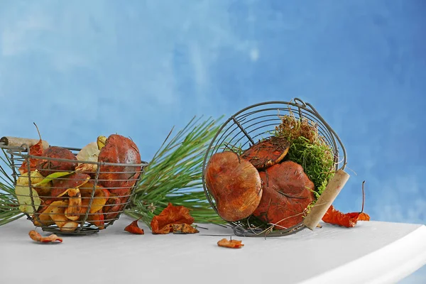 Fresh mushrooms in metal baskets — Stock Photo, Image