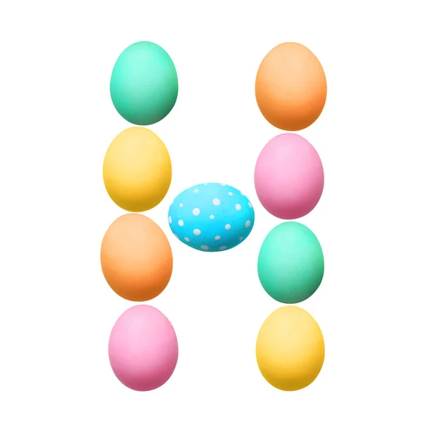 Lettre H faite d'œufs de Pâques — Photo