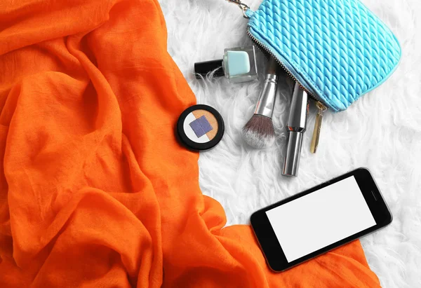 Female accessories on white fluffy carpet — Stock Photo, Image