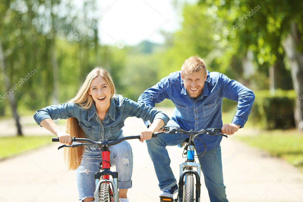 Happy couple with bicycle
