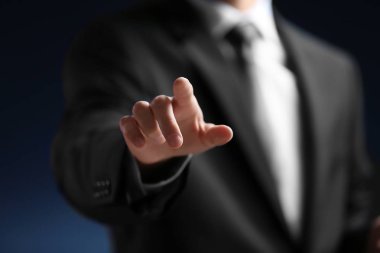 Businessman hand pointing