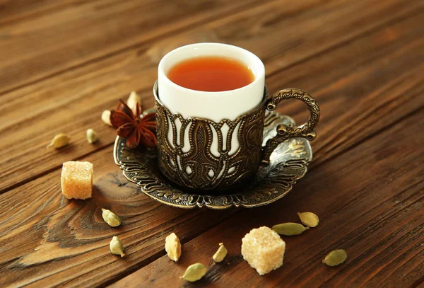 Fresh tea in vintage cup — Stock Photo, Image