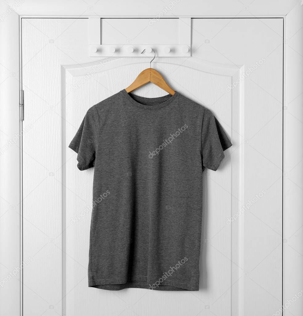 Blank t-shirt on white door