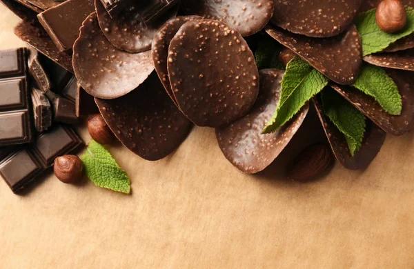Chocolate chips and mint leaves — Stock Photo, Image