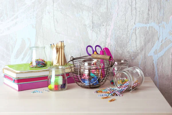 Paperclips and tools in jars — Stock Photo, Image