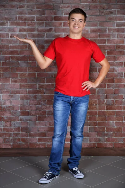 Young man in blank t-shirt — Stock Photo, Image