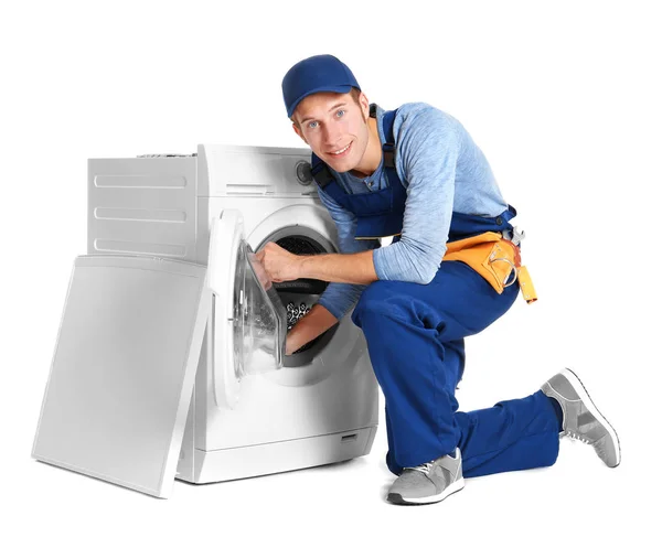 Encanador com máquina de lavar roupa — Fotografia de Stock