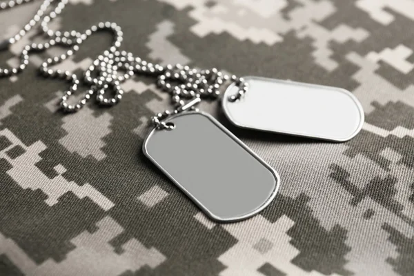 Army tokens on uniform — Stock Photo, Image