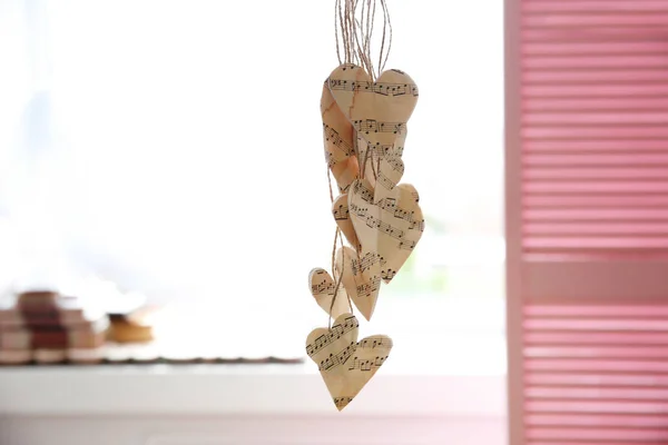 Paper hearts with music notes