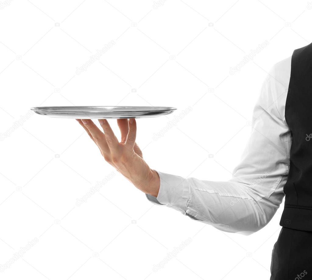 Hand of waiter with metal tray