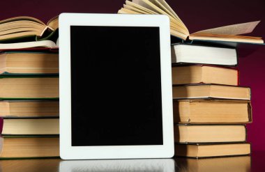 Tablet ve yığın kitap