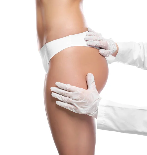 Surgeon examine female body — Stock Photo, Image