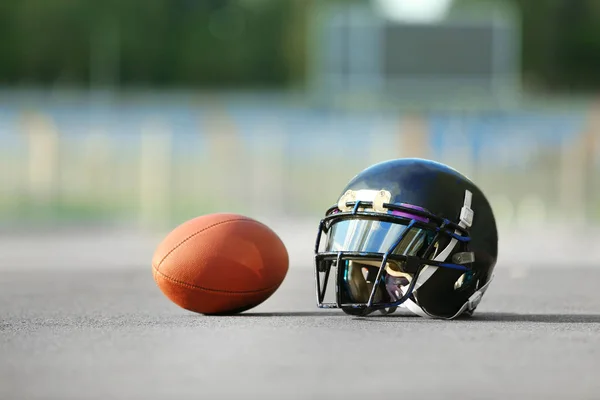 Rugby helmet with ball — Stock Photo, Image
