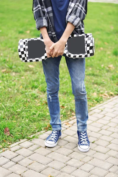Teenager boy with hoverboard — Stock Photo, Image