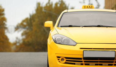 Yellow car with taxi sign clipart