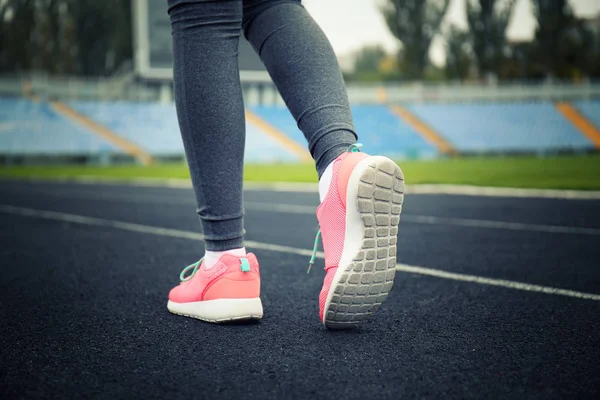 Runner legs at stadium — Stock Photo, Image