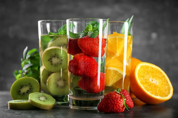 Water with fresh fruits — Stock Photo, Image