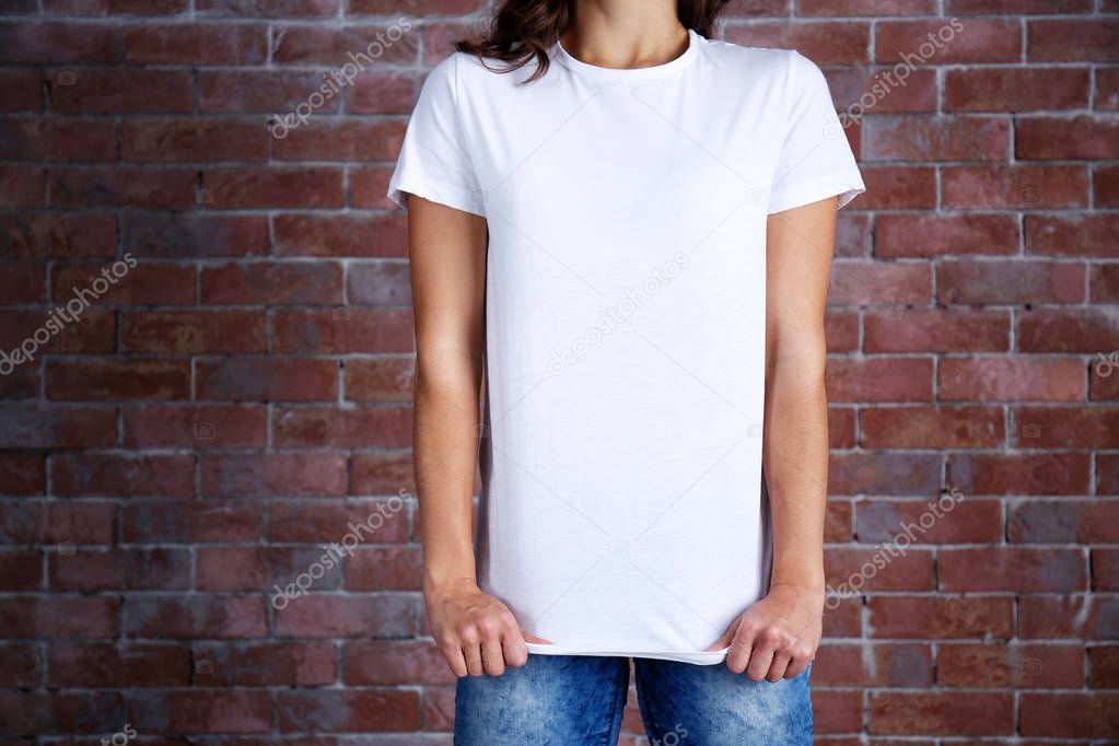 Young woman in blank white t-shirt