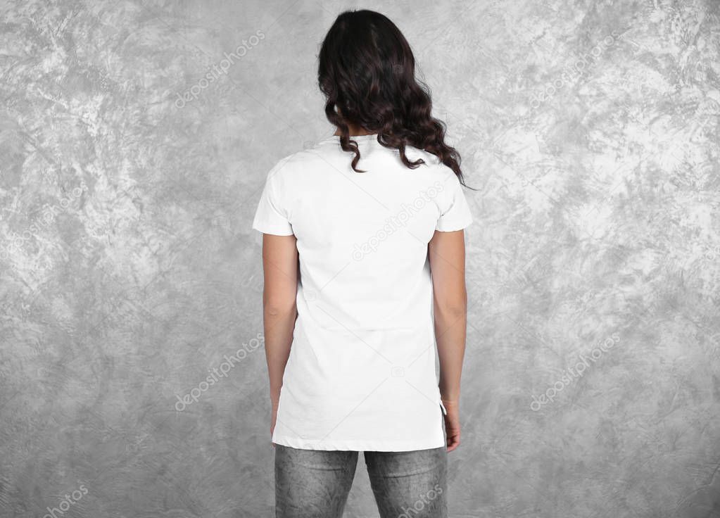 Young woman in blank white t-shirt