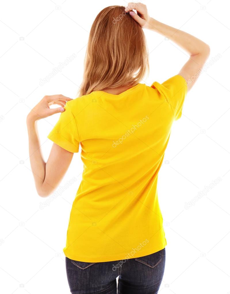 Young woman in blank yellow t-shirt