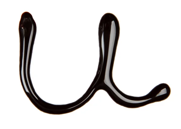 Litery wykonane z syrop czekoladowy — Zdjęcie stockowe