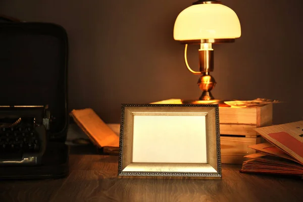 Photo frame and standing lamp — Stock Photo, Image
