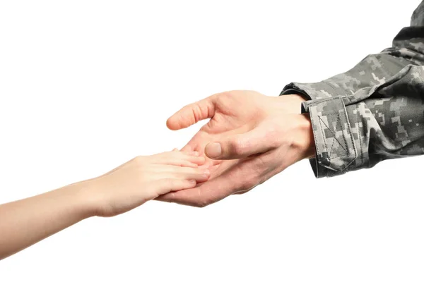 Hands of soldier and child — Stock Photo, Image