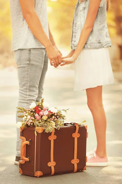 Couple and vintage suitcase — Stock Photo, Image