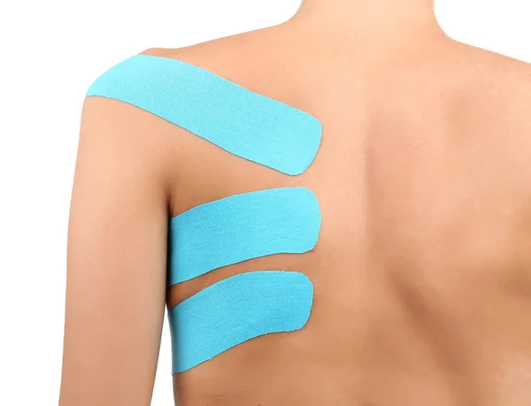 Shoulder with physio tape — Stock Photo, Image