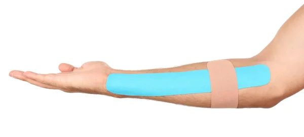 Physio tape on arm — Stock Photo, Image