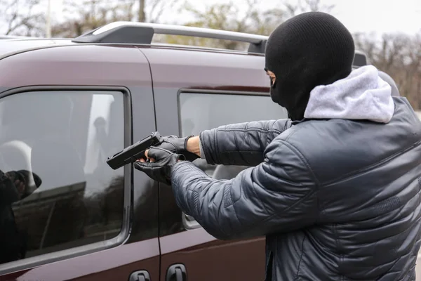 Male thief with pistol — Stock Photo, Image