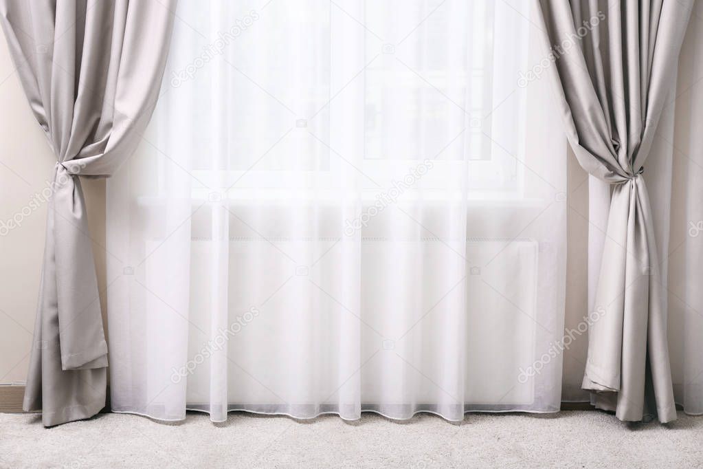 Window with elegant curtain