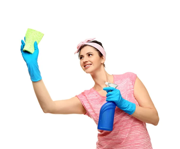 Young cleaner with sponge and spray on white background — Stock Photo, Image