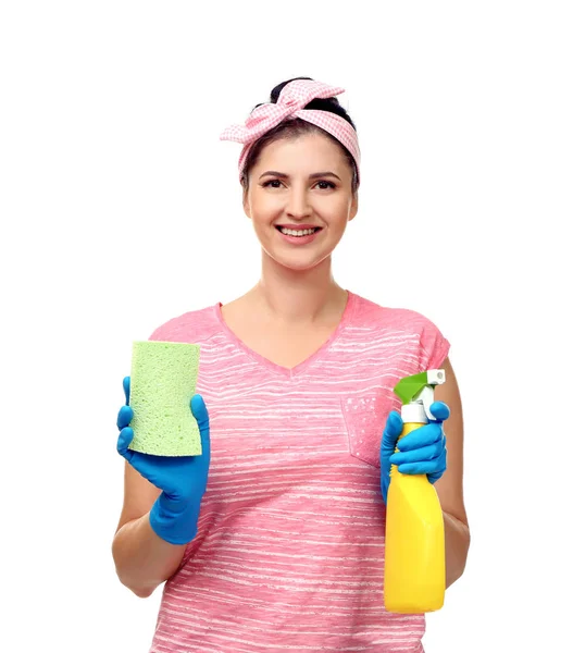 Young cleaner with sponge and spray on white background — Stock Photo, Image