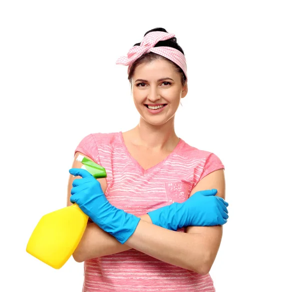 Jovem limpador com spray sobre fundo branco — Fotografia de Stock