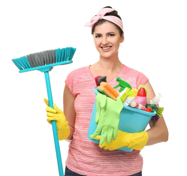 Young cleaner with cleaning tools on white background — Stock Photo, Image