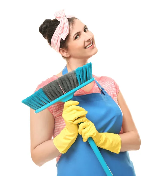 Young cleaner with brush on white background — Stock Photo, Image