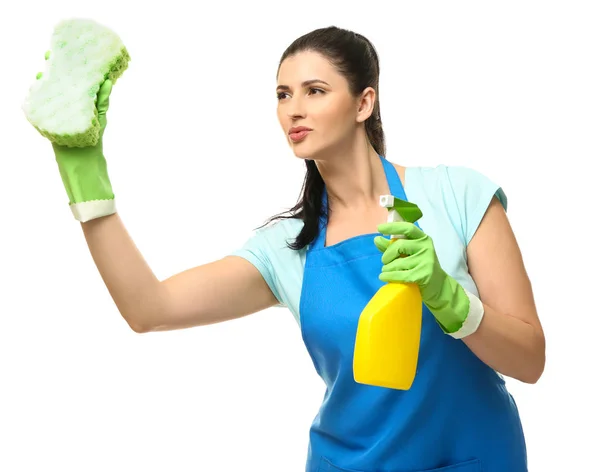 Young cleaner with sponge and spray on white background — Stock Photo, Image