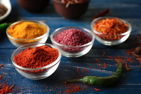 Spices in glass bowls — Stock Photo, Image
