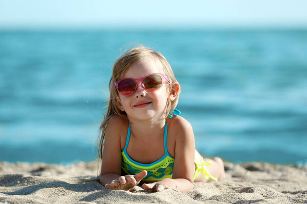 Cute girl having fun on beach